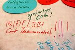 Auf einem Zettel steht IQ, FiF, JB - gute Zusammenarbeit